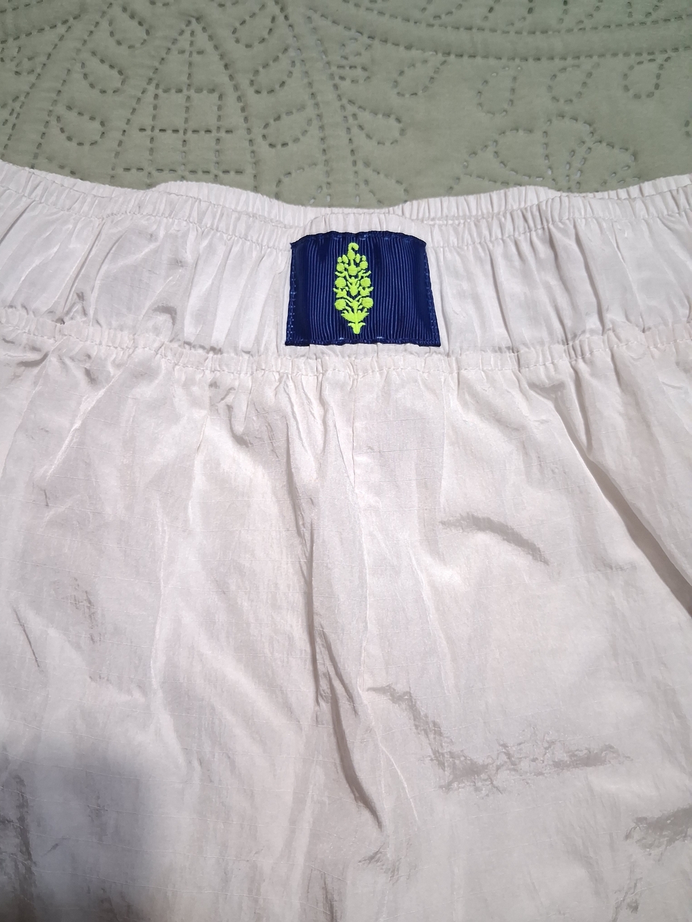 FP Movement by Free People White Athletic Shorts with Navy Trim - Picture 2 of 6